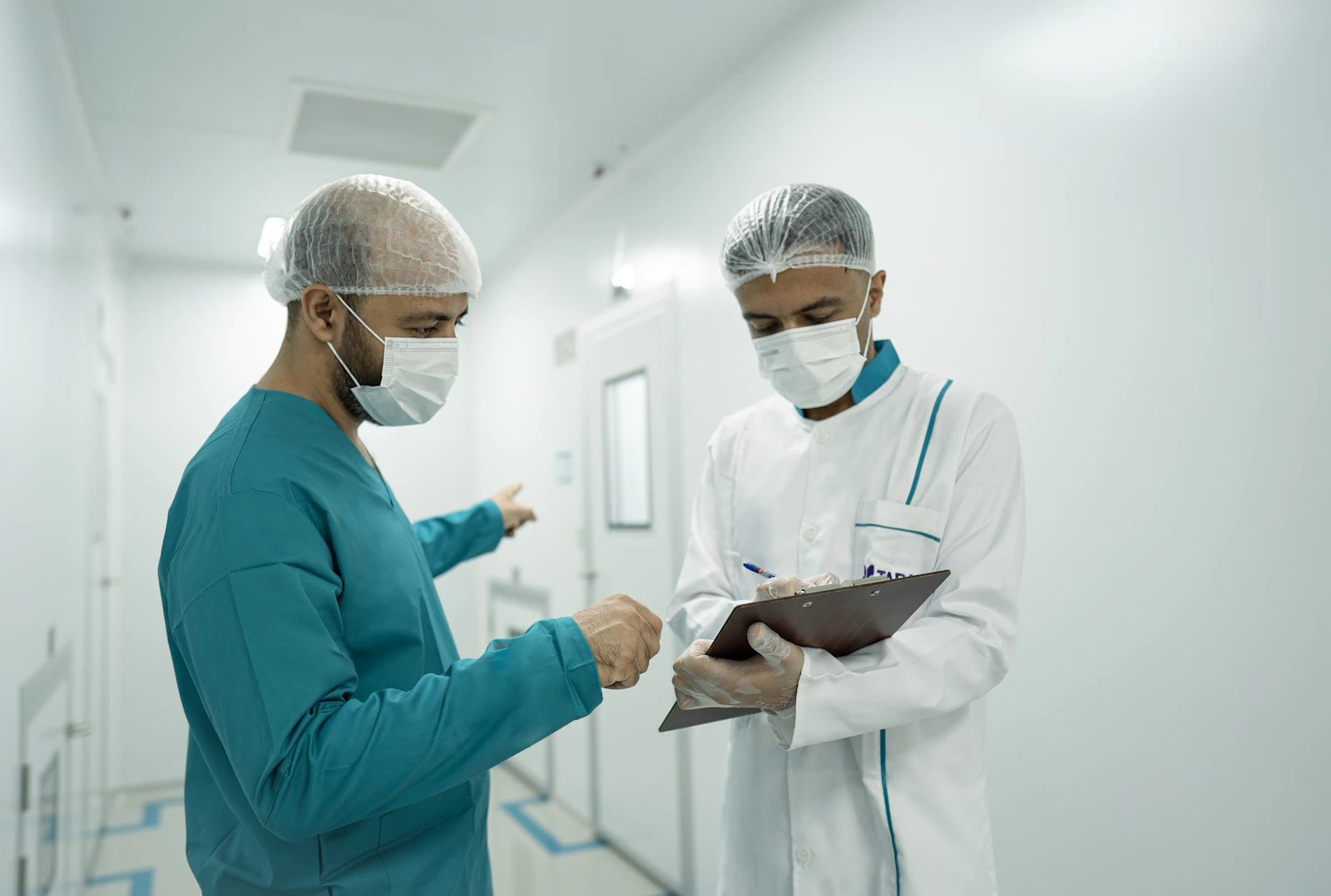 Healthcare professionals collaborating on patient documentation